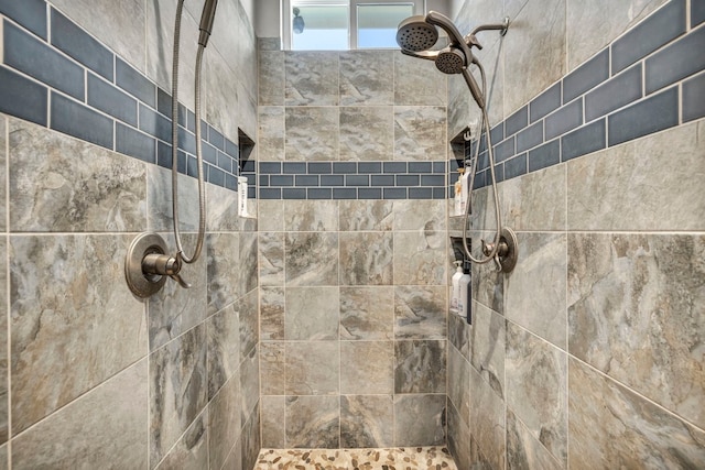 interior space featuring a tile shower