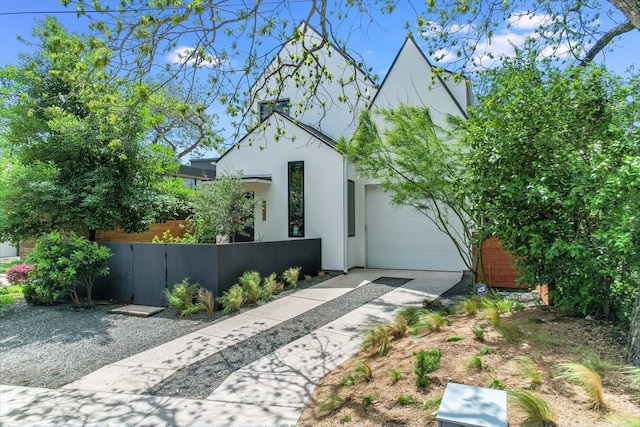 view of side of property with a garage