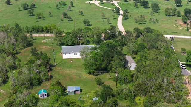 birds eye view of property featuring a rural view