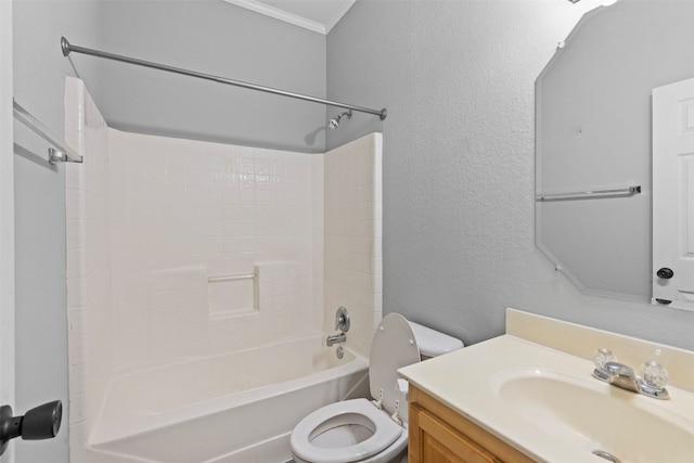 full bathroom with crown molding, toilet, vanity, and shower / bathtub combination