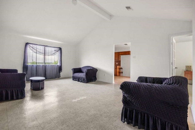 living room with beamed ceiling, light tile floors, and high vaulted ceiling