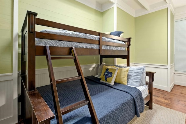 bedroom with wood-type flooring