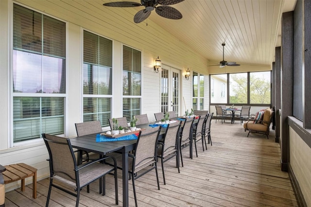 sunroom with wooden ceiling and ceiling fan