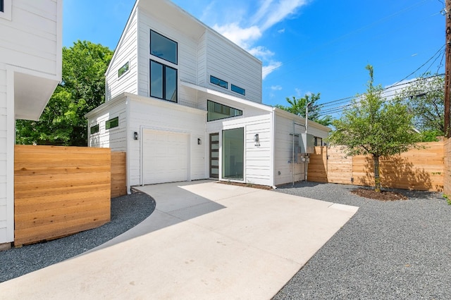 contemporary home featuring a garage