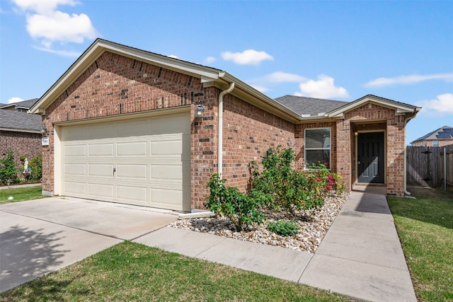 ranch-style home featuring a garage, concrete driveway, roof with shingles, fence, and brick siding