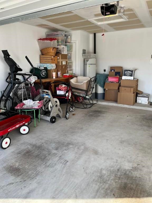 garage featuring a garage door opener