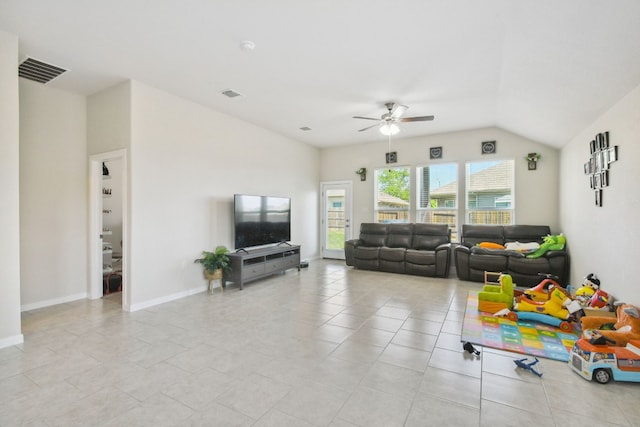 living room featuring light tile flooring, ceiling fan, and lofted ceiling