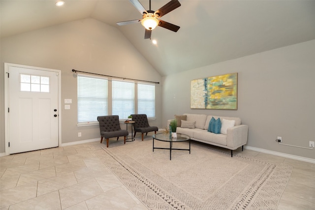 tiled living room featuring high vaulted ceiling and ceiling fan