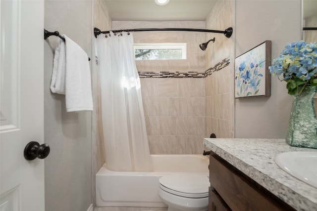 full bathroom featuring vanity, toilet, and shower / bath combo with shower curtain