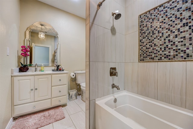 full bathroom with tiled shower / bath combo, vanity, tile patterned flooring, and toilet