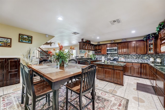 dining space with sink