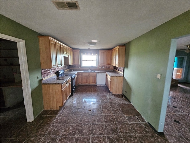 kitchen featuring electric stove, sink, dark tile flooring, backsplash, and white dishwasher