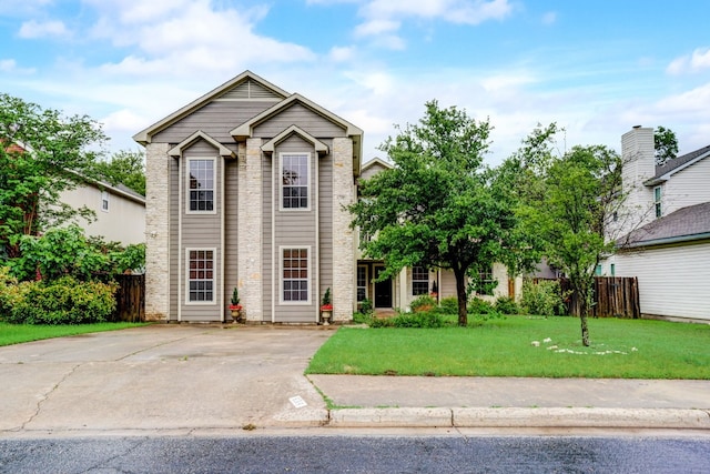 view of front of home featuring a front yard