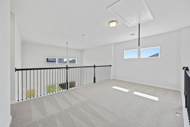 spare room featuring carpet floors