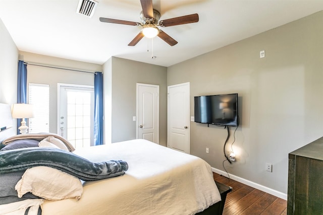 bedroom featuring ceiling fan and dark hardwood / wood-style floors