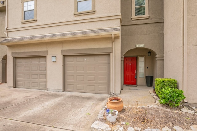 entrance to property with a garage