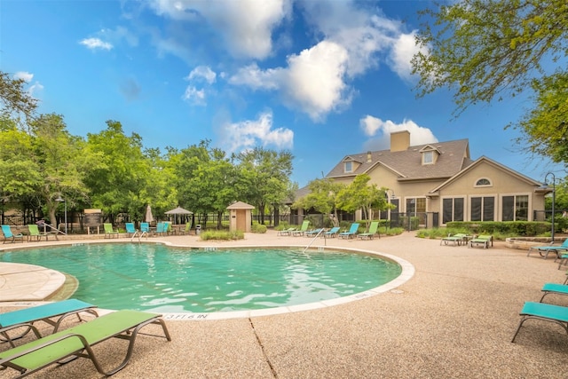 view of pool featuring a patio