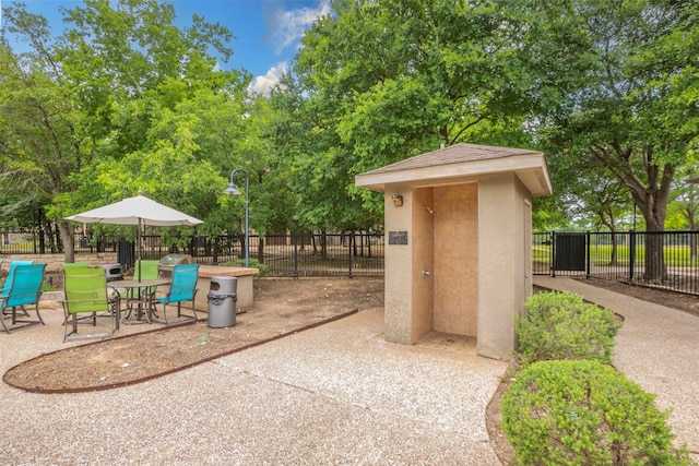 view of patio with a grill