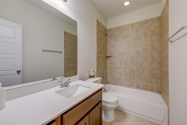 full bathroom featuring toilet, vanity, and tiled shower / bath