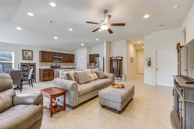 living room featuring ceiling fan