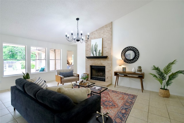 tiled living room featuring a textured ceiling, lofted ceiling, a fireplace, and an inviting chandelier