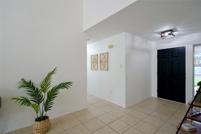 entrance foyer featuring a textured ceiling