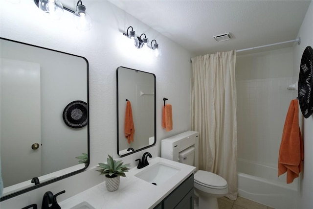 full bathroom with vanity, tile patterned flooring, shower / bathtub combination with curtain, and toilet