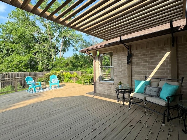 wooden deck with a pergola