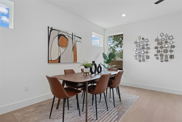 dining area with light wood-type flooring