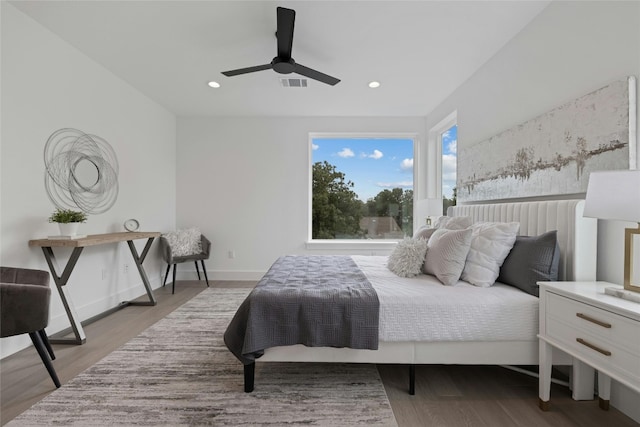 bedroom with light wood-type flooring and ceiling fan