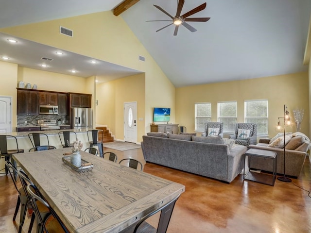 dining area featuring beamed ceiling, high vaulted ceiling, and ceiling fan