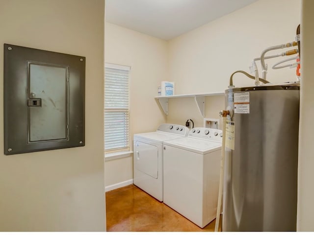 clothes washing area featuring water heater, light tile floors, hookup for a washing machine, and washer and dryer