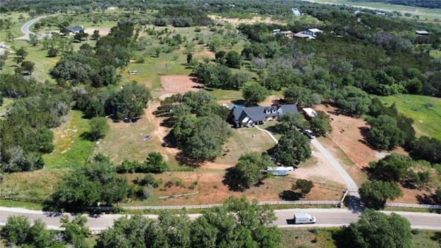 birds eye view of property featuring a rural view