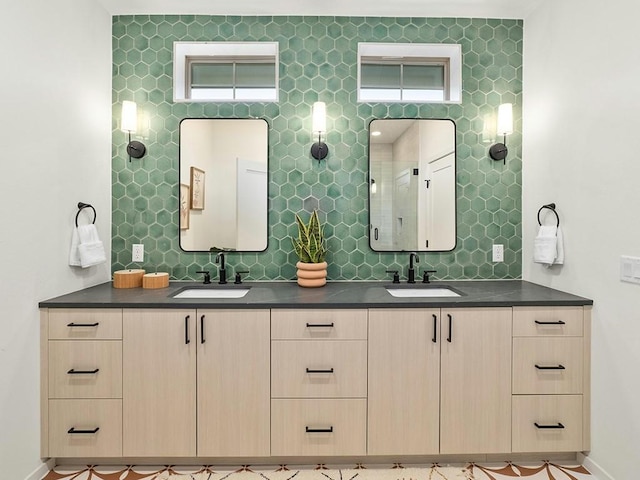 bathroom featuring vanity and decorative backsplash