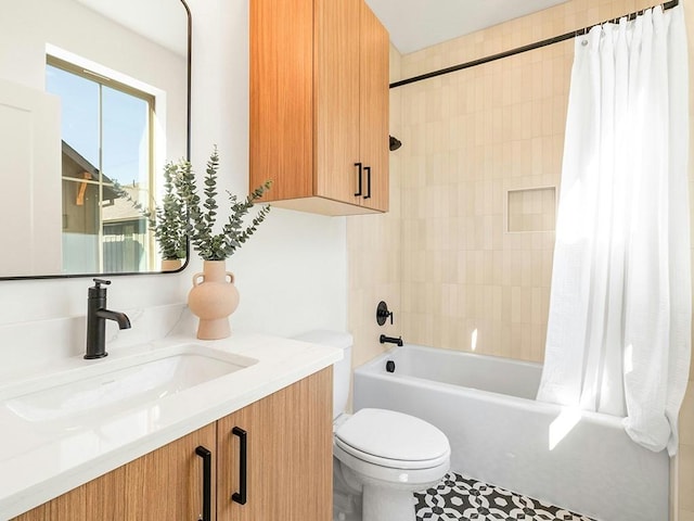 full bathroom featuring vanity, shower / bathtub combination with curtain, and toilet