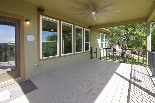 wooden terrace with ceiling fan