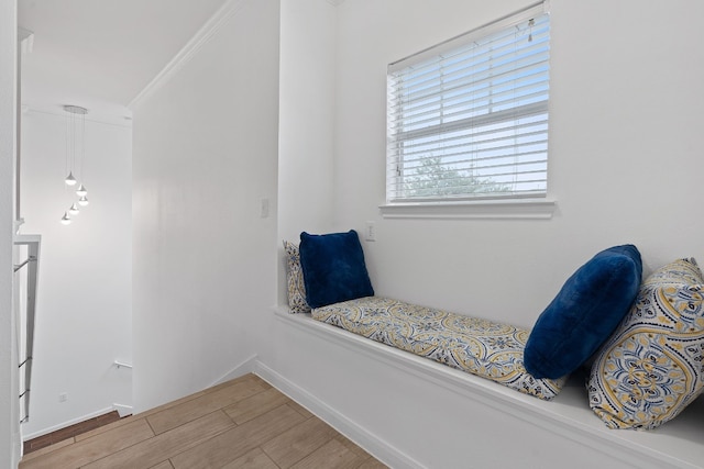 bedroom featuring hardwood / wood-style floors and crown molding