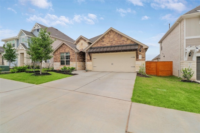 craftsman-style home with a garage and a front yard