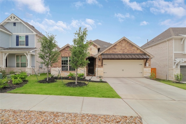 view of front of home with a front lawn and a garage