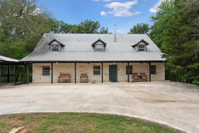 view of front of home with a carport