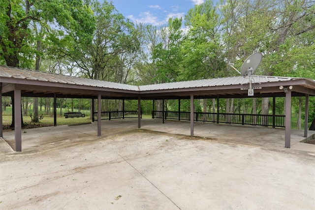 view of parking / parking lot with a carport