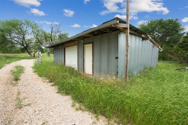 view of outdoor structure with a garage