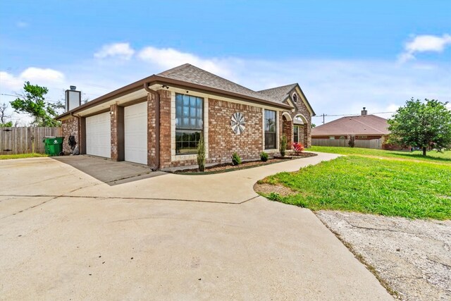 view of front of home with a front lawn