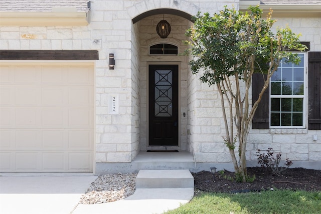 entrance to property with a garage