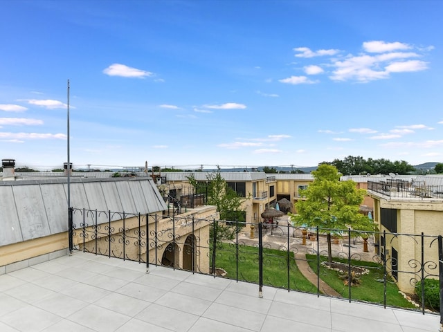 view of patio / terrace with a balcony