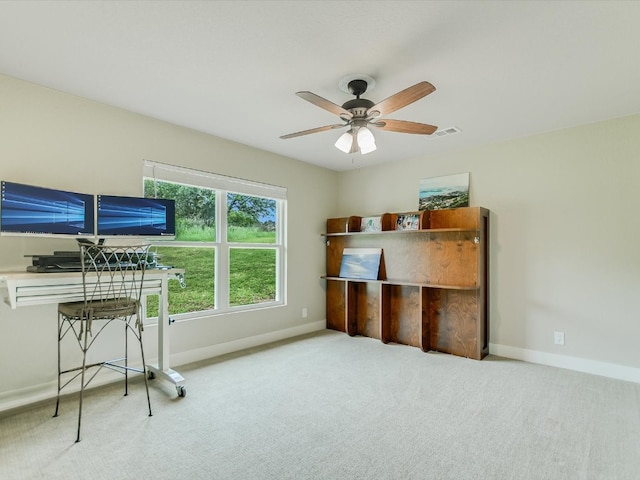 miscellaneous room with light colored carpet and ceiling fan