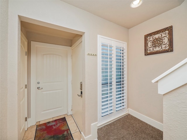 view of tiled foyer