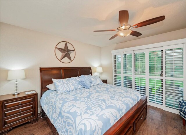 bedroom with dark wood-type flooring, access to outside, and a ceiling fan