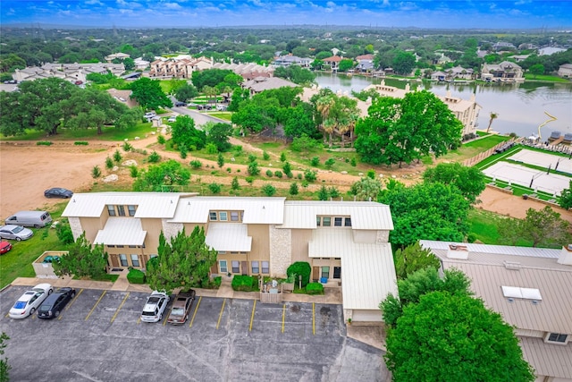 bird's eye view with a residential view and a water view