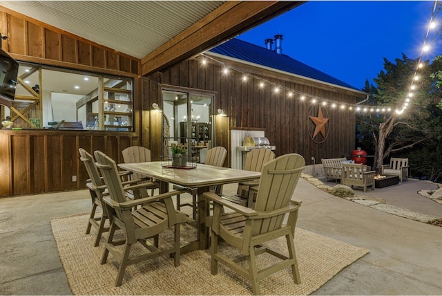 view of patio at night